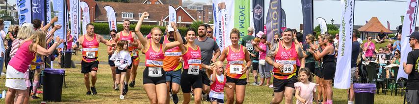 People running for charity at the Clifftop challenge 2023